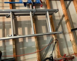 spreader garage items gas cans wheelbarrow generator