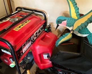 spreader garage items gas cans wheelbarrow generator