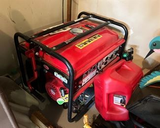 spreader garage items gas cans wheelbarrow generator