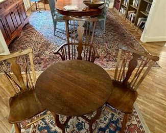 Stickley walnut chairs shown with a Antique folding walnut table