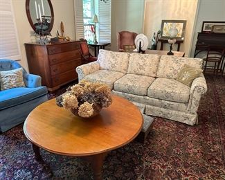 1960’s living room photo with antique walnut cocktail table