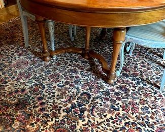 Antique cherry dining table extents to 102”