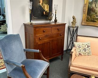 Vintage blue velvet mahogany arm chair with upholstery tacking.