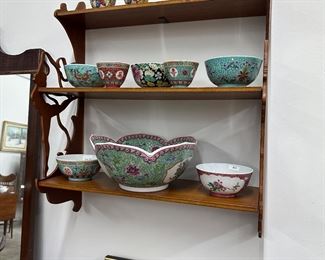 Collection of Asian rice bowls and tea cups