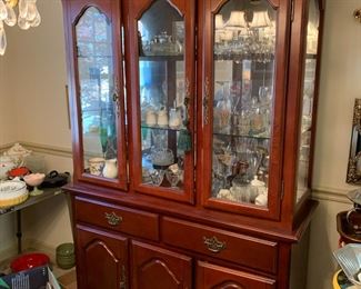 #12	China cabinet with 2 drawers 3 wood door and 3 glass door 50x18x82 2 piece 	 $100.00 			
