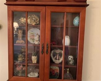 #15	wall hanging 2 door display cabinet with 2 glass doors  4 shelves  17x3x21	 $30.00 			
