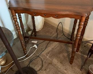 #23	table with 6 legs 32x19x29 as is water damage top 	 $75.00 			
