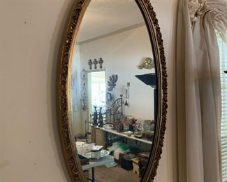 #30	oval gold painted mirror  21x39	 $50.00 			
