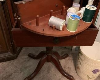 #31	sewing cabinet with 1 pull out drawer and 1 swivel thread drawer on pedestal 16x12x25	 $100.00 			
