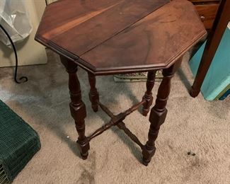 #41	folding wood octangle table on 4 folding legs 15x22	 $30.00 			
