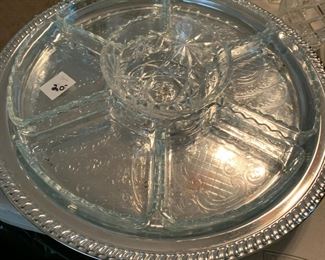 #76	silver swivel tray with glass condiment dishes 	 $20.00 			
