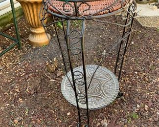 #115	wicker and metal base stand with shelf 26 tall 	 $20.00 			
