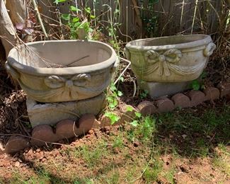 #119	concrete oval pot with bow 19x12x9	 $20.00 			
#120	concrete oval pot with bow 19x12x9	 $20.00 			
#121	concrete oval pot with bow 19x12x9	 $20.00 			
