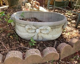 #119	concrete oval pot with bow 19x12x9	 $20.00 			
#120	concrete oval pot with bow 19x12x9	 $20.00 			
#121	concrete oval pot with bow 19x12x9	 $20.00 			

