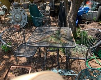 #124	iron table  with 2 chairs 28x29	 $75.00 			
