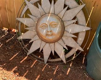 #128	sunshine metal round wall hanging 37	 $40.00 			
