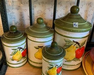 #167	4 piece ceramic canister set with pear on front 12-7 inch tall 	 $20.00 			
