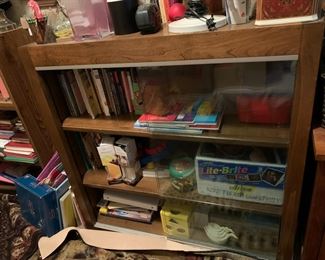 #200	cabinet	bookcase with 3 shelves and sliding glass door 	 $75.00 			
