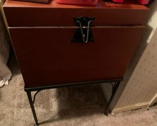#201	cabinet	trunk on metal legs	 $75.00 		 	
