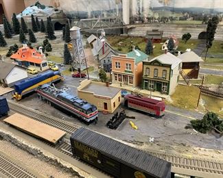 Large Train Set and Lots of Cars, Buildings, etc.,