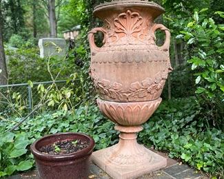 Three piece vintage terra cotta urn statuary.