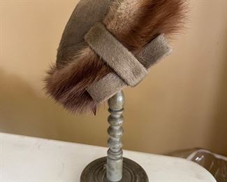 Vintage hat with fur and hat stand