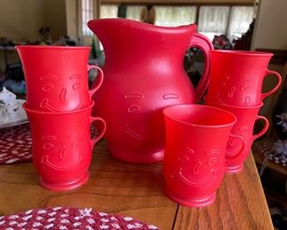 Vintage red Kool Aid plastic pitcher and 5 cups