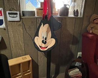 Coat rack and Mickey Mouse tote