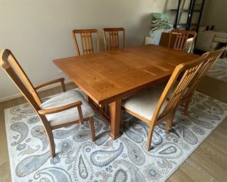 Dining table with (6) chairs, (1) leaf not shown and pads...