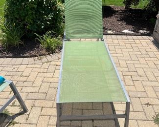 (2) patio lounge chairs with teal covers.....