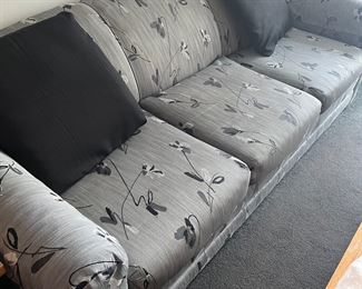 Gray black, pink upholstered  sofa now