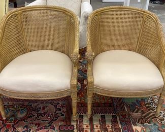 Pair of Caned Chairs with Rams Head Arms