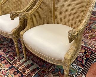 Pair of Caned Chairs with Rams Head Arms