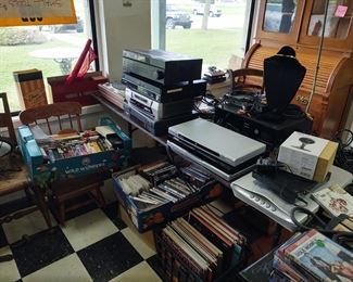 Lots of electronic stuff speakers receivers DVD players