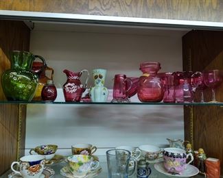 Red glass and teacups