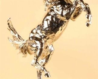 Lorenzo Ghiglieri (1931-2020) "Lorenzo's Horse" - Medium: Nickel Plated Bronze - Signed lower center. Measures 38" x 27?.                                                                                                                                                                                                                                                Lorenzo?s work graces the walls of the most prestigious establishments in the world. His sculptures and paintings have been presented to Pope John Paul II at The Vatican in Rome, President Ronald Reagan at the White House, Mikhail Gorbachev of the Kremlin and King Juan Carlos of the Royal Palace in Madrid.Tiger Woods, Luciano Pavarotti and General Schwartzko pf are a few others who take pride in their ownership of a Lorenzo Ghiglieri sculpture.In 1994, Lorenzo sculpted the Official American Bald Eagle in bronze, silver,and gold, now on display at the White House and part of their permanent collection.Later, he was commissioned to c