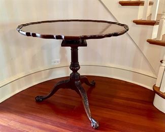 Baker Chippendale-style tilt-top piecrust table              29"h x 33.5" diameter  $950.00