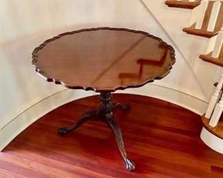 Baker Chippendale-style tilt-top piecrust table              29"h x 33.5" diameter  $950.00