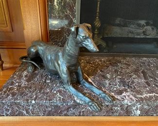 Metal Greyhound figure     12"h x 24" long  $250.00