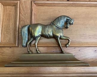 2 Horse doorstops or mantle figures  