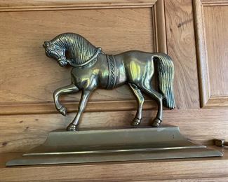 2 Horse doorstops or mantle figures   