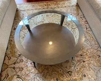 Glass & iron coffee table   $550.00                                     16"h x 36" diameter