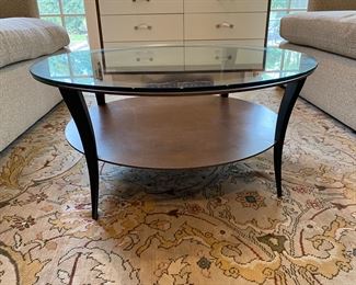 Glass & iron coffee table   $550.00                                     16"h x 36" diameter