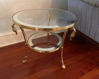 Pr. glass & brass swan side tables    $575.00                                                      20"h x 20" diameter