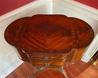 Maitland-Smith Classical-style table   $850.00                                             32"h x 25"w x 15.5"d 