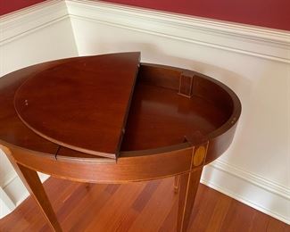 Baker inlaid oval double lift-top table         $450.00