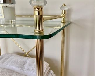 Front Gate brass and glass shelves     $250.00                                             55.5"h x 19.5"w x 15"d