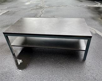 Steel and wood coffee table                          $200.00                                                          17"h x 47.5" long x 23.5"d