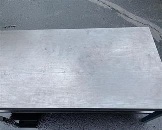 Steel and wood coffee table                          $200.00                                                          17"h x 47.5" long x 23.5"d