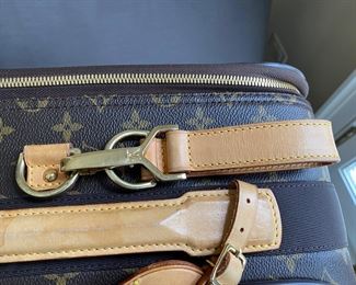 Louis Vuitton suitcase                                                                 23"h x 16"w x 7.75"d  interior strap is detached